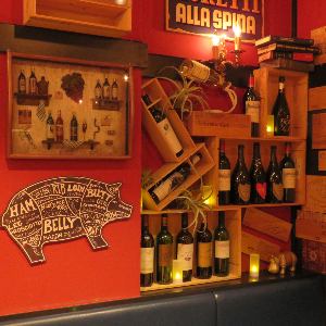 The interior of the store is lined with wine bottles, and is a space filled with the owner's passion.