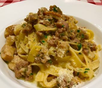 Homemade tagliatelle with bacon and porcini mushrooms