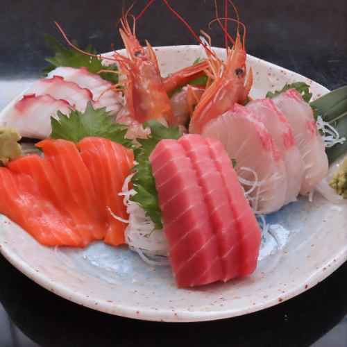 Five pieces of raw fish sashimi