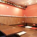 A tatami room with a sunken kotatsu table.