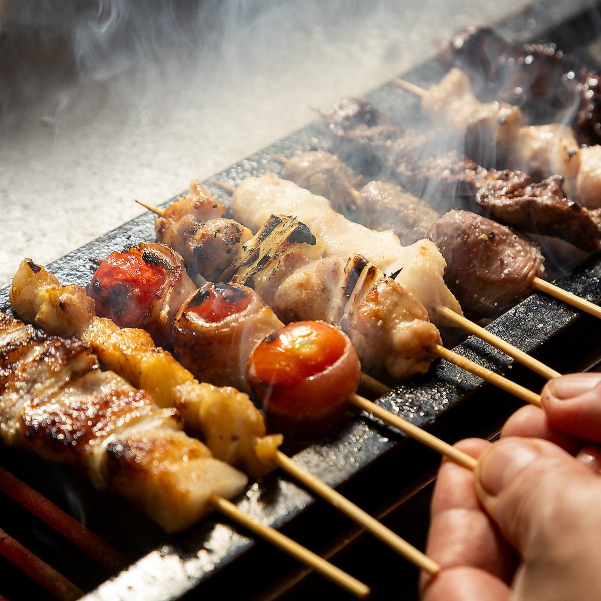 A 150-minute all-you-can-drink course is available, including sesame mackerel, yakitori skewers, and steak.