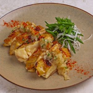 Grilled chicken thigh with herbs