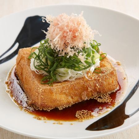 Homemade silken fried tofu topped with Kujo green onion