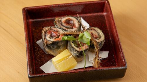 Sardine wrapped in perilla leaves and plum paste