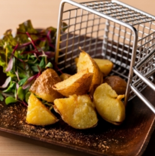 Basket of fried potatoes with salted shrimp