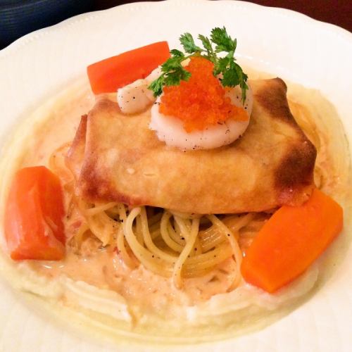 Crepe-wrapped seafood with fresh pasta