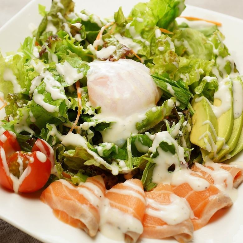 Japanese-style salad with baby leaf and aged fish