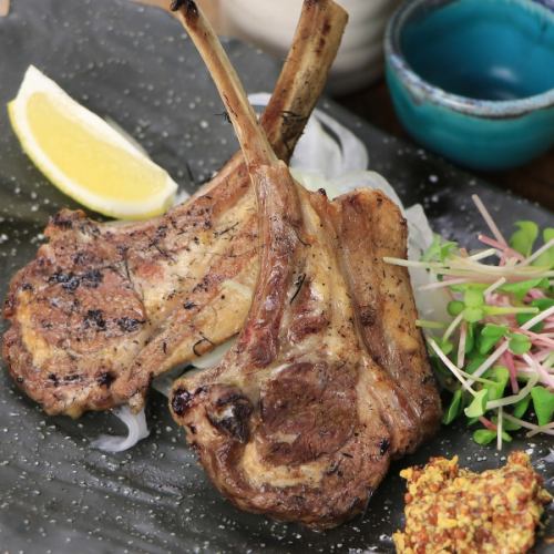 Straw-grilled bone-in lamb marinated in beer yeast