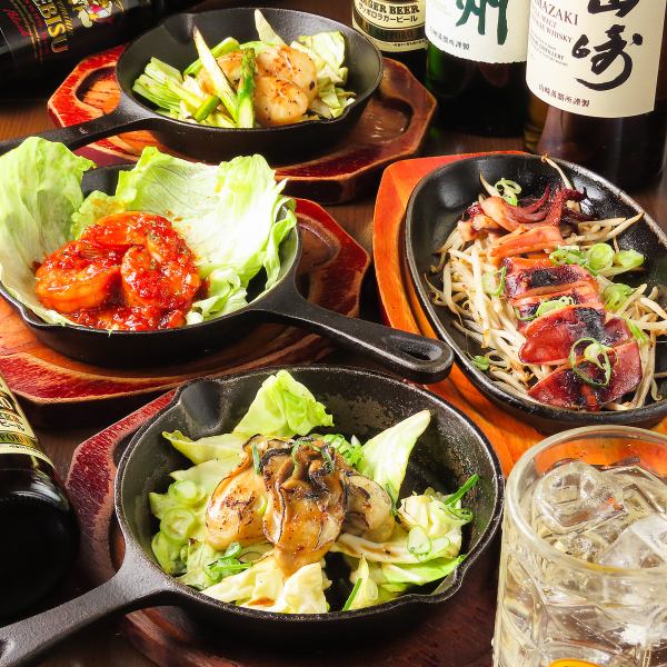 広島産カキと海鮮の鉄板焼き ― 磯の香りと焦がしバターが絡み合う『贅沢』