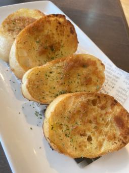 Garlic baguette (4 pieces)
