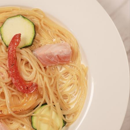 Salmon and colorful vegetable lemon cream pasta