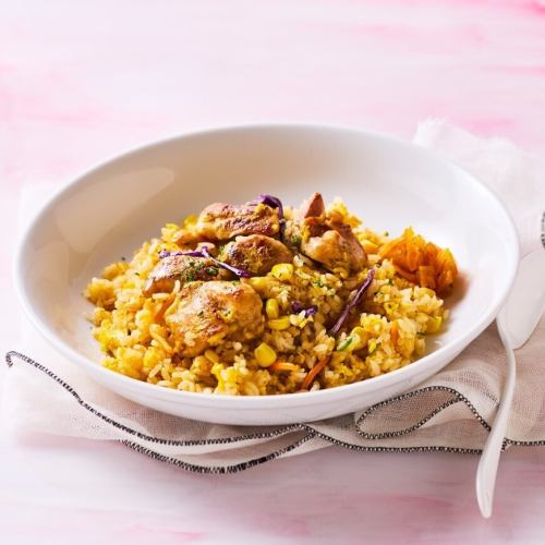 Charcoal grilled chicken with garlic butter pilaf
