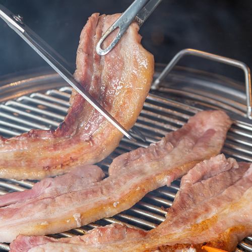 Please enjoy our signature samgyeopsal!