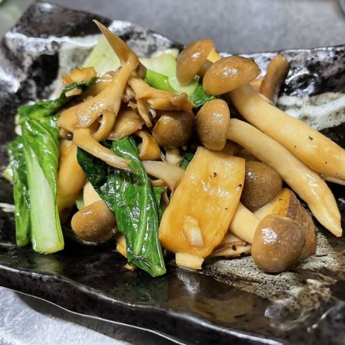 Smoked mushrooms and bok choy stir-fried with garlic, butter and soy sauce