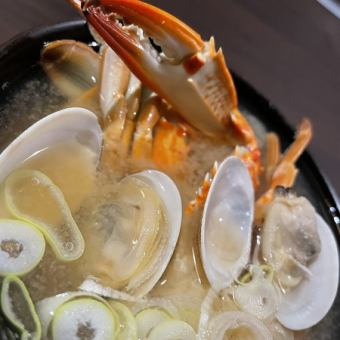 Rich miso soup with blue crab and clams