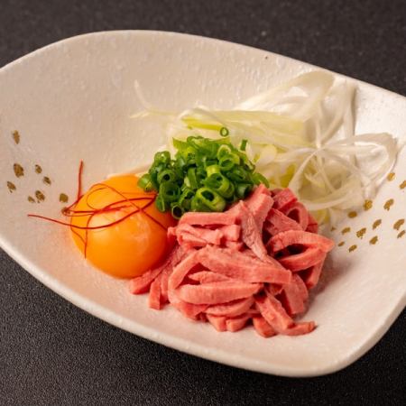 Beef tongue sashimi with green onions and salty yukhoe