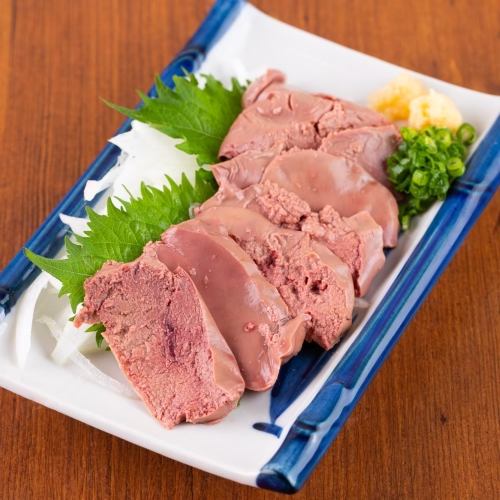 Low temperature cooked rare white liver sashimi