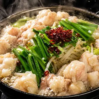 "Special Motsunabe Course" - 13 dishes including two kinds of fresh fish platter and special broth motsunabe, with all-you-can-drink for 3800 yen.