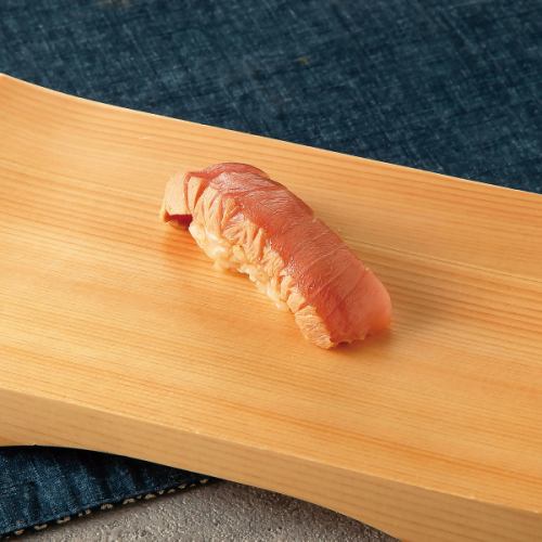 Seasonal Nigiri Sushi: 1 piece of medium-fatty tuna marinated