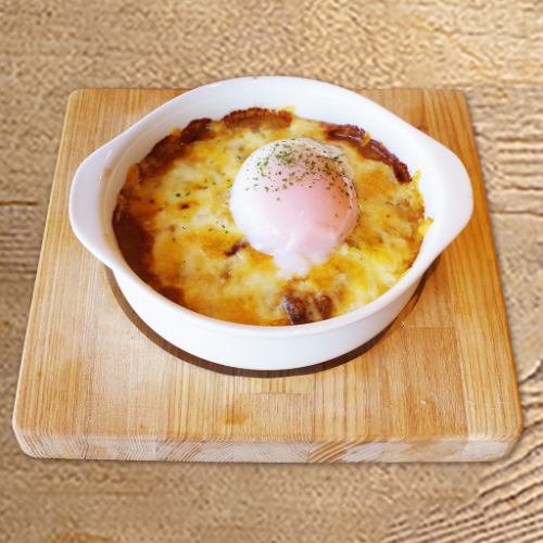 Curry doria topped with a half-boiled egg