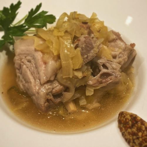 Soft-braised pork belly served with sauerkraut