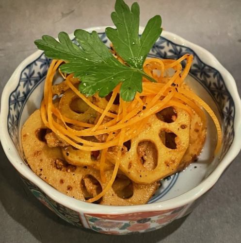 Spice-marinated lotus root and bacon