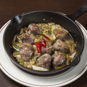 Gizzard and white onion simmered in oil with cumin flavor