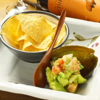 Salmon and avocado dip with tortilla chips