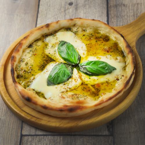 Basil and cheese pizza