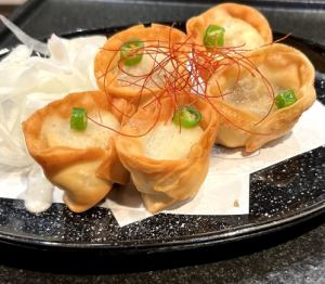 Deep-fried beef tongue gyoza with green chili pepper