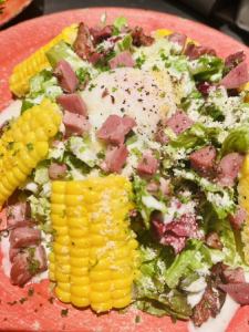 Smoked beef tongue and seasonal vegetable Caesar salad with soft-boiled egg