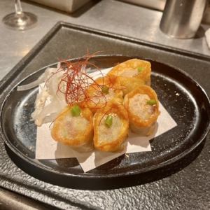 Deep-fried beef tongue dumplings with green chili peppers