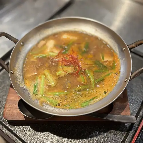 Hot and steaming beef tongue and beef offal stew