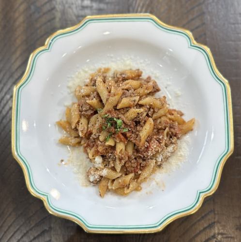 Black Wagyu beef and salsiccia meat sauce with penne