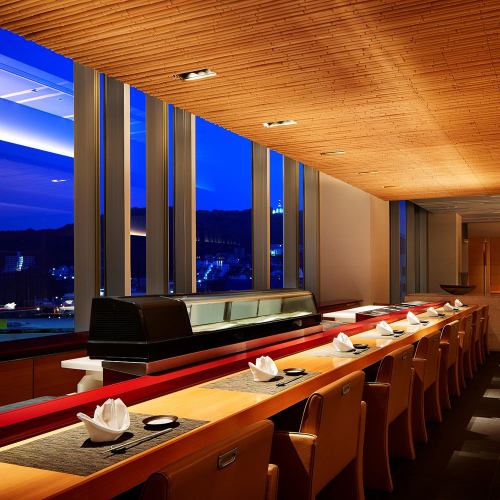 Sushi counter with night view
