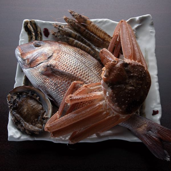 新鮮な魚介類の鉄板焼き