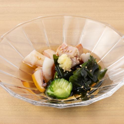 Squid ears and wakame seaweed in vinegar