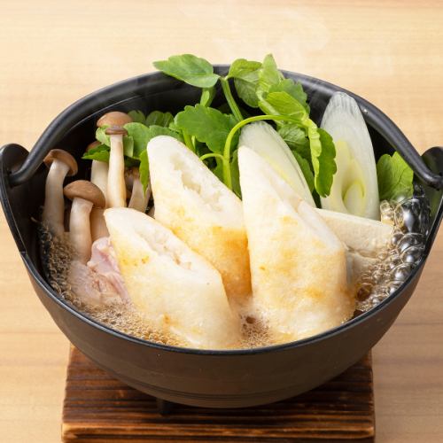 A small pot of parsley and kiritanpo