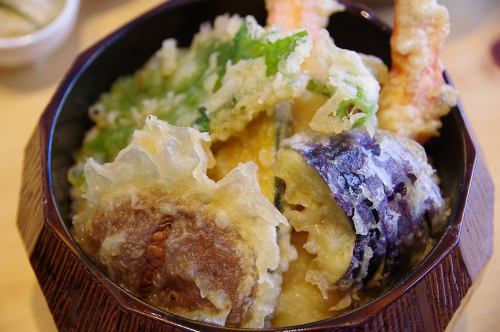 Bowl of rice and fried fish