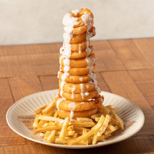 Onion ring tower & french fries with sour cream sauce