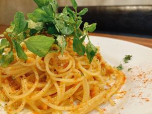 Rich butter spaghettini with sea urchin and watercress