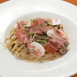 Prosciutto and mushroom in a rich cream sauce