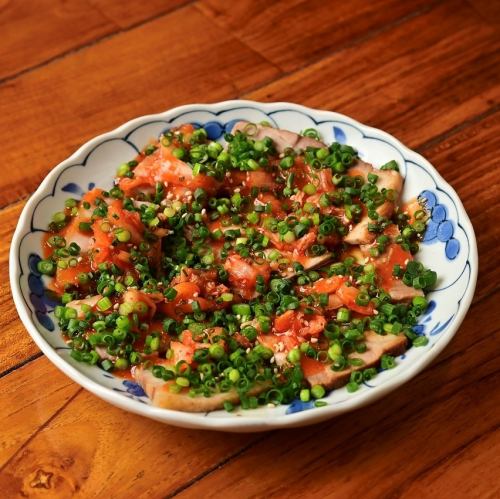 Char siu covered in green onions