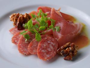 Assortment of Spanish jamon serrano and salami