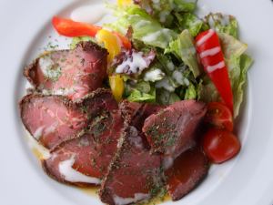 Homemade roast beef with red wine gravy