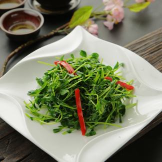 Fried pea sprouts with garlic