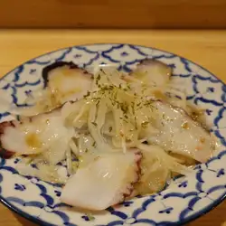 Octopus carpaccio (marinated style)
