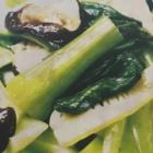 Stir-fried green bok choy with shiitake mushrooms and garlic
