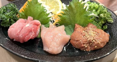 Assortment of three kinds of sashimi (oily liver, thigh, and chicken breast)