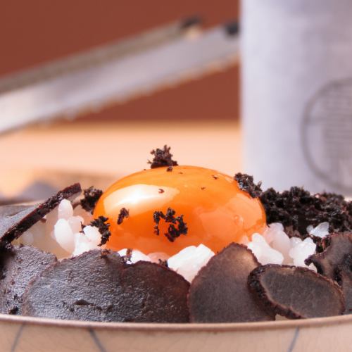 Rice with truffle eggs